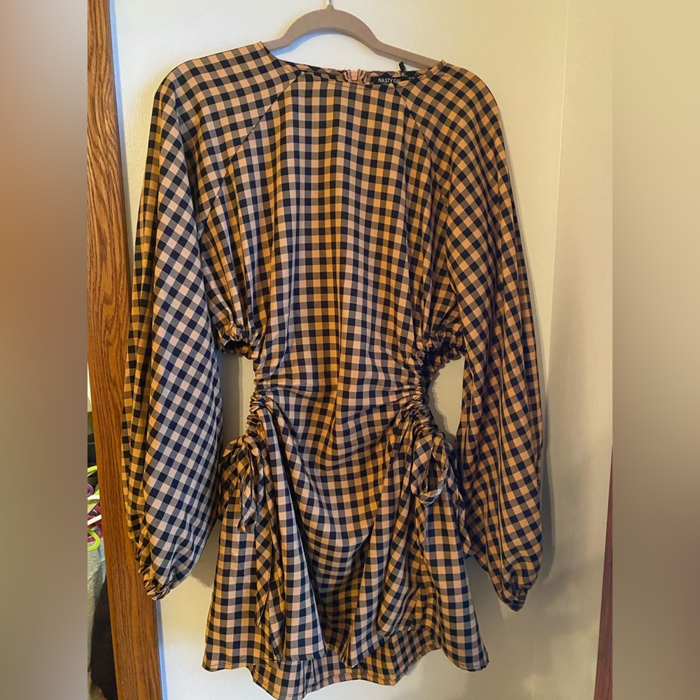 never worn long sleeve checkered dress with cutout detail on the sides